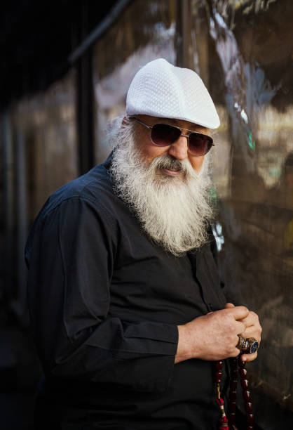 istock Daylight portrait of a senior man with a large white beard 1490303054