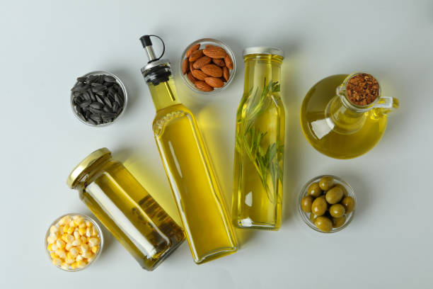 istock Set of different oils on light gray background 1490308787