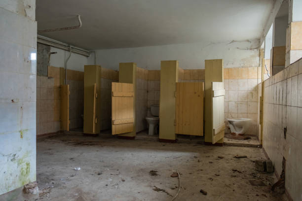 istock abandoned toilet, toilet cubicles 1490308853
