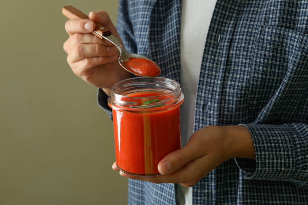 istock Woman eat Gazpacho soup from glass jar 1490310566