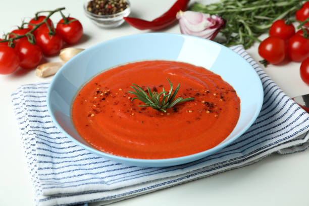 istock Gazpacho soup and ingredients on white background 1490311848