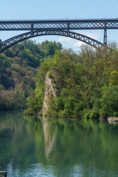 istock Iron bridge over Adda river at Paderno 1490313645