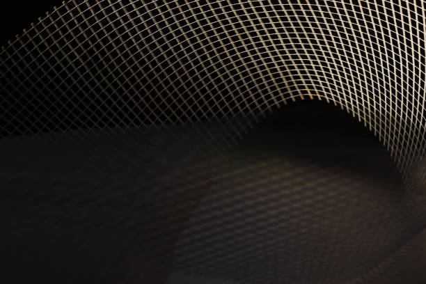 istock Abstract white curved shape with dark background. Background and texture of net. background and texture of grid. 1490315841
