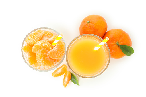 Mandarin juice and ingredients isolated on white background