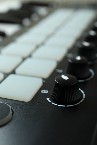 istock Midi keyboard all over background, close up 1490320430