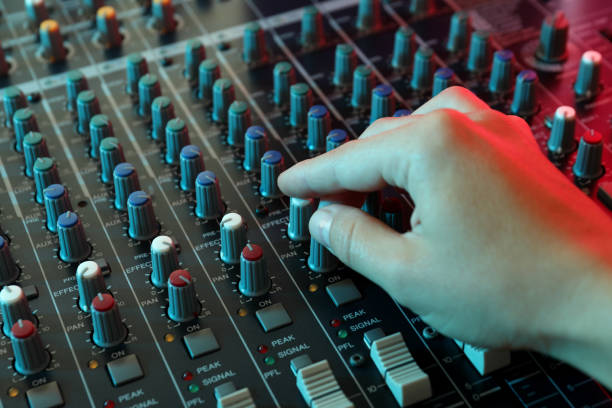istock The musician adjusts the sound on audio mixer 1490320683