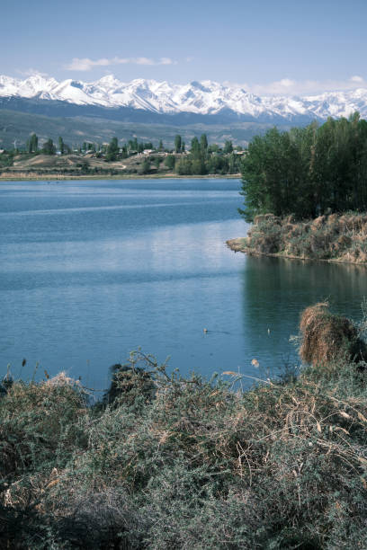 istock Mountain village on the lakeshore 1490320712