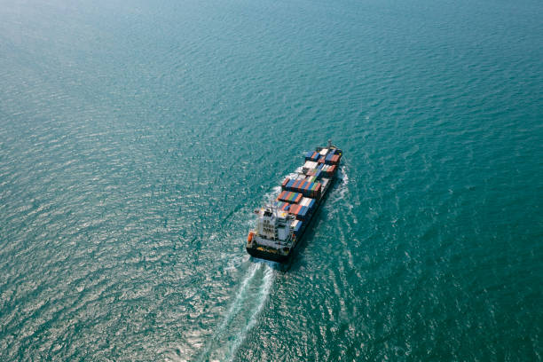 istock containers ship in import export cargo logistics Transportation international and worldwide in sea fright, business services and industrial mode of transport concept aerial view 1490322546