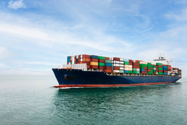 istock Big size container ship full speed sailing in deep sea for transporting cargo logistic import and export goods internationally around the world, including Asia Pacific and Europe, business and industry delivery service transportation concept, front view 1490323170