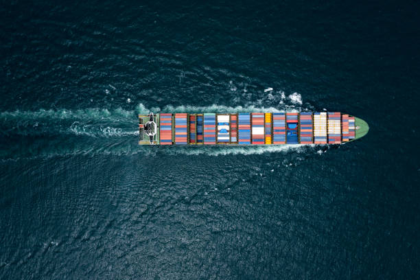 istock container cargo ship sailing full speed in pacific ocean to transport goods import export internationally or worldwide as business and industrial transport and marine services open sea aerial top view from drone 1490323181