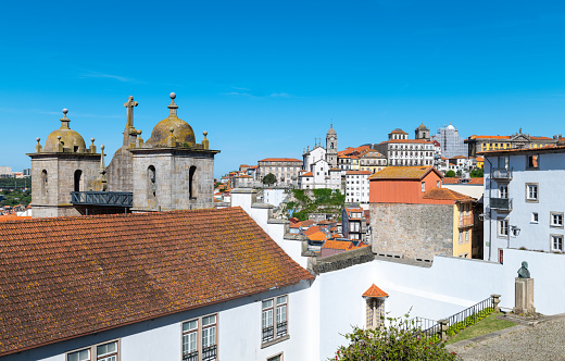 Porto, Portugal, the Ribeira district with the Dos Grilos church in the foreground, seen from the Cathedral square lookout