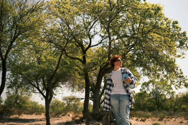 istock Happy woman is having a road trip in tropical climate 1490325823