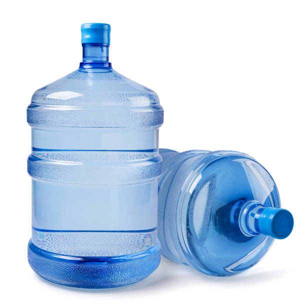 istock Two bottles of water for a cooler on a white background. Isolated 1490328740