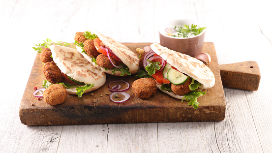 Kebab sandwich with fried falafel, vegetable and sauce