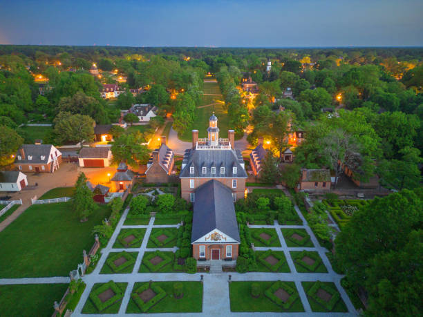 Historic WIlliamsburg, Viriginia, USA Williamsburg, VA, USA - May 8, 2023: Historic Williamsburg Village at the Governor's Palace at twilight. governor's palace williamsburg stock pictures, royalty-free photos & images