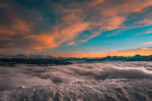 A stunning sunset over a majestic mountain range.Hafelekarspitze, Austria.