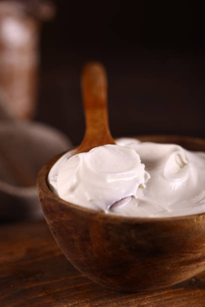 istock natural organic sour cream on wooden table 1490337259