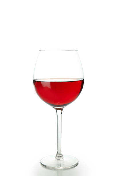 istock Glass of red wine isolated on white background 1490338526