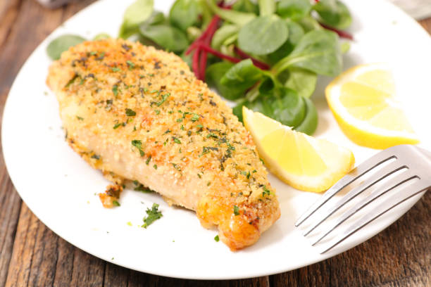 istock chicken breast breaded with fresh salad and sauce 1490340169