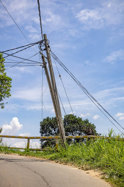 istock Oblique electricity pole at the roadside 1490340483