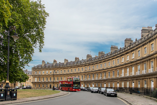 Bath, Somerset, England-August 2022; Side view of Circus, a historic ring of Georgian architecture large townhouses forming a circle with three entrances designed by architect John Wood