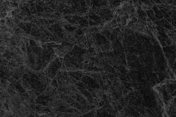 istock Old black marble texture. Abstract dark gloomy grunge fine textured background 1490345995