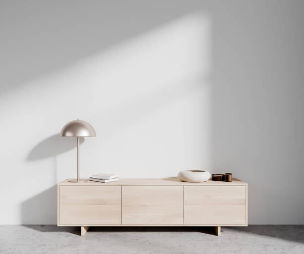 istock White gallery room interior with sideboard and decoration. Mockup empty wall 1490349017