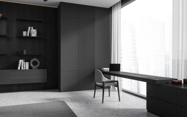 istock Dark home living room interior with workplace, decoration and panoramic window 1490349208