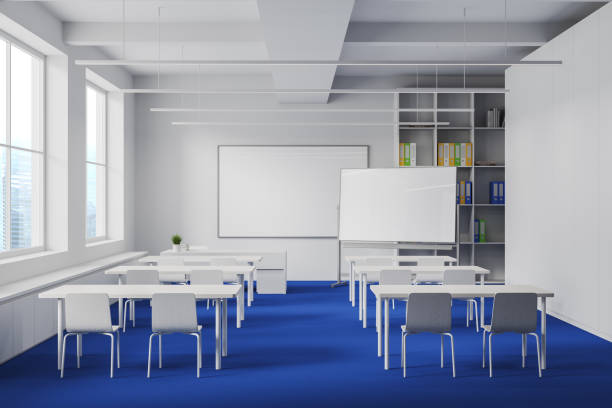 istock White and blue classroom interior with table in row and chalkboard mockup 1490350552