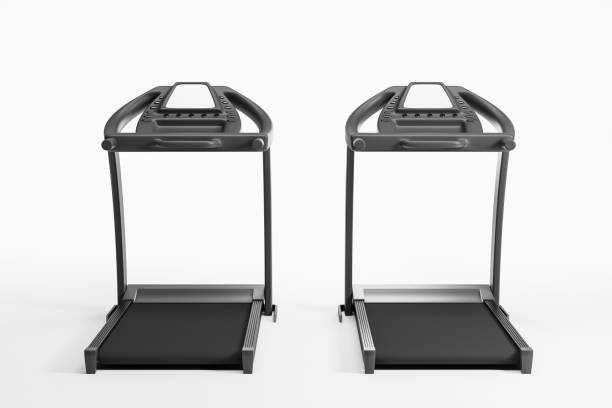 istock Treadmills in row with blank display on empty white background, gym concept 1490350672