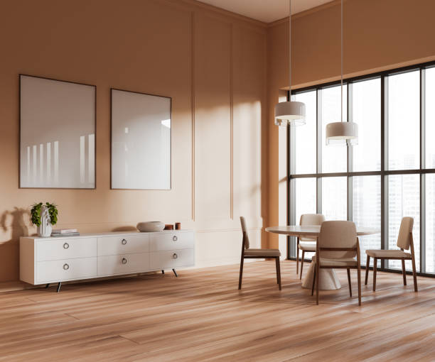 istock Beige dining room with dresser and posters 1490350783