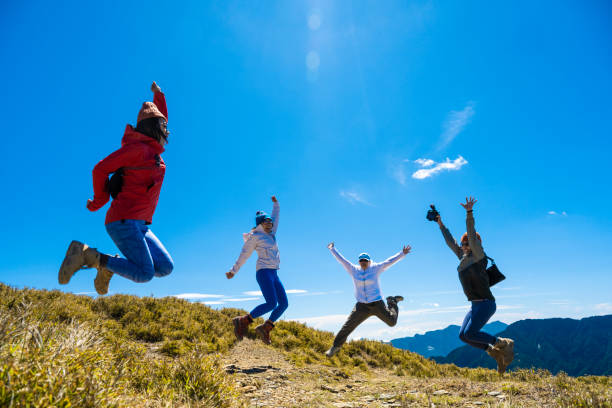 istock Good friends hiking together on the mountain. 1490350907