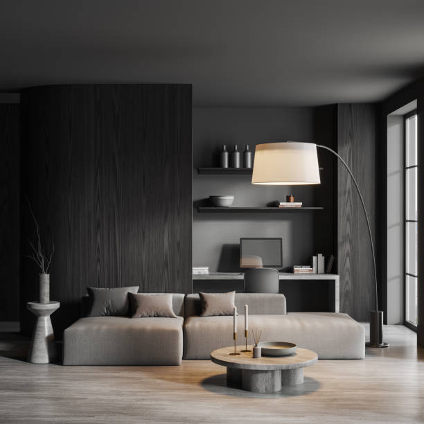 istock Grey living room interior with couch and workplace with decoration and window 1490350992