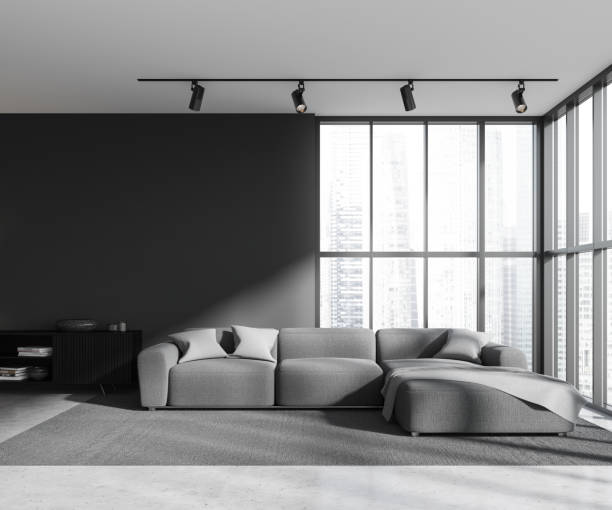istock Grey living room interior with couch and sideboard, window. Mockup wall 1490351249