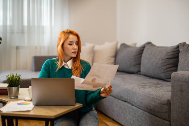istock Woman using laptop, writing email,online meeting or payment online 1490351359