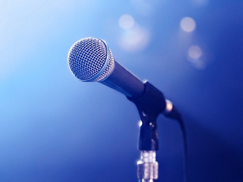 Vocal microphone on stage with lighting