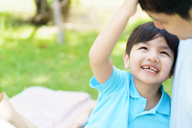 istock Dad and son picnic in the backyard. 1490356529