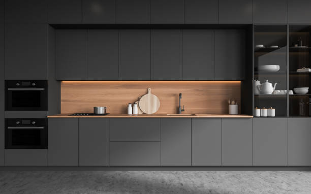istock Gray and wooden kitchen with cabinets and cupboard 1490357173