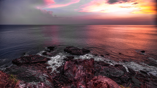 Smooth waves at the shoreline while beautiful sunset at koh Lanta,Krabi,Thailand.