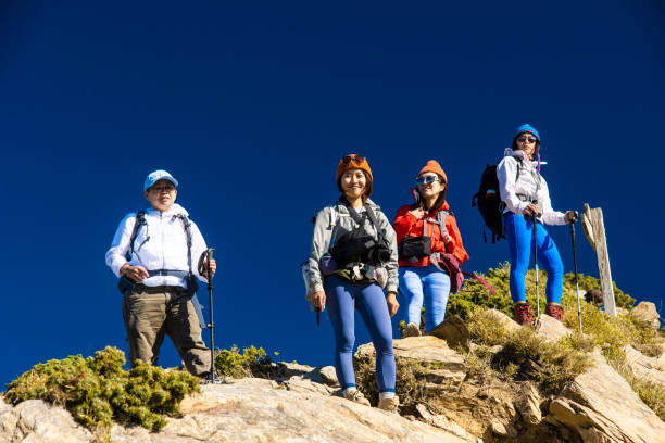 istock Good friends hiking together on the mountain. 1490360245