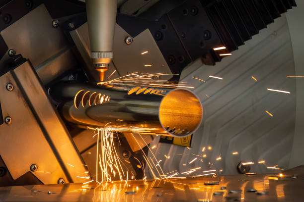The fiber laser cutting machine cutting  machine cut the stainless steel tube. stock photo