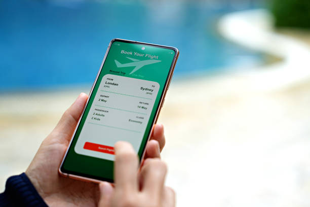 istock The cropped image shows an Asian woman using a smartphone to book flight tickets and plan her holiday. 1490361349
