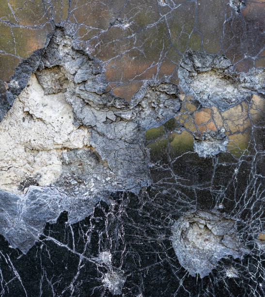 istock Shelled wall. Facade of a bombed-out house. 1490365935