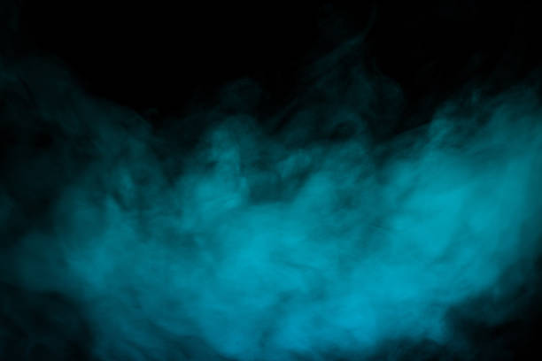 istock Abstract blue smoke moves on black background. Swirling smoke. 1490366470