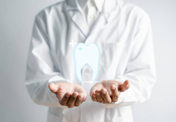 istock Dental teeth examined dentist check-up via excavator with technology concept. 1490370571