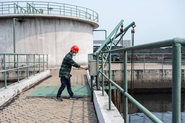 istock An Asian female engineer works at a coal factory 1490373103