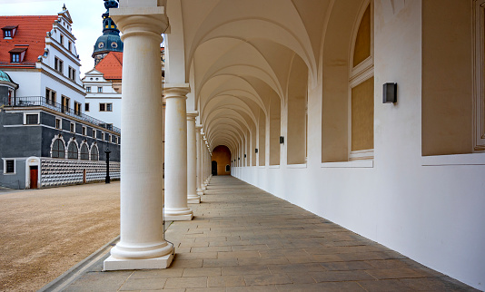 view along the pillars of the long passageway (Langer Gang) in the stable yard (Stallhof),  part of the Dresden Castle, Germany