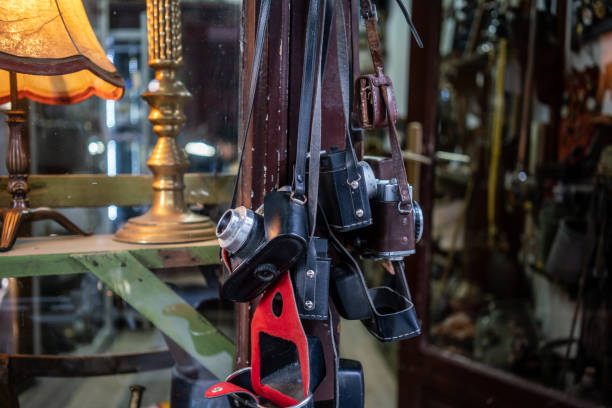 istock old cameras are hanging focus on foreground horizontal travel still 1490377814