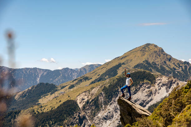 istock Hiker on the top of the mountain peak. 1490379123