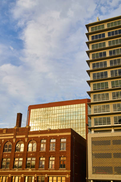 istock Downtown city buildings with sunlight hitting windows 1490381924